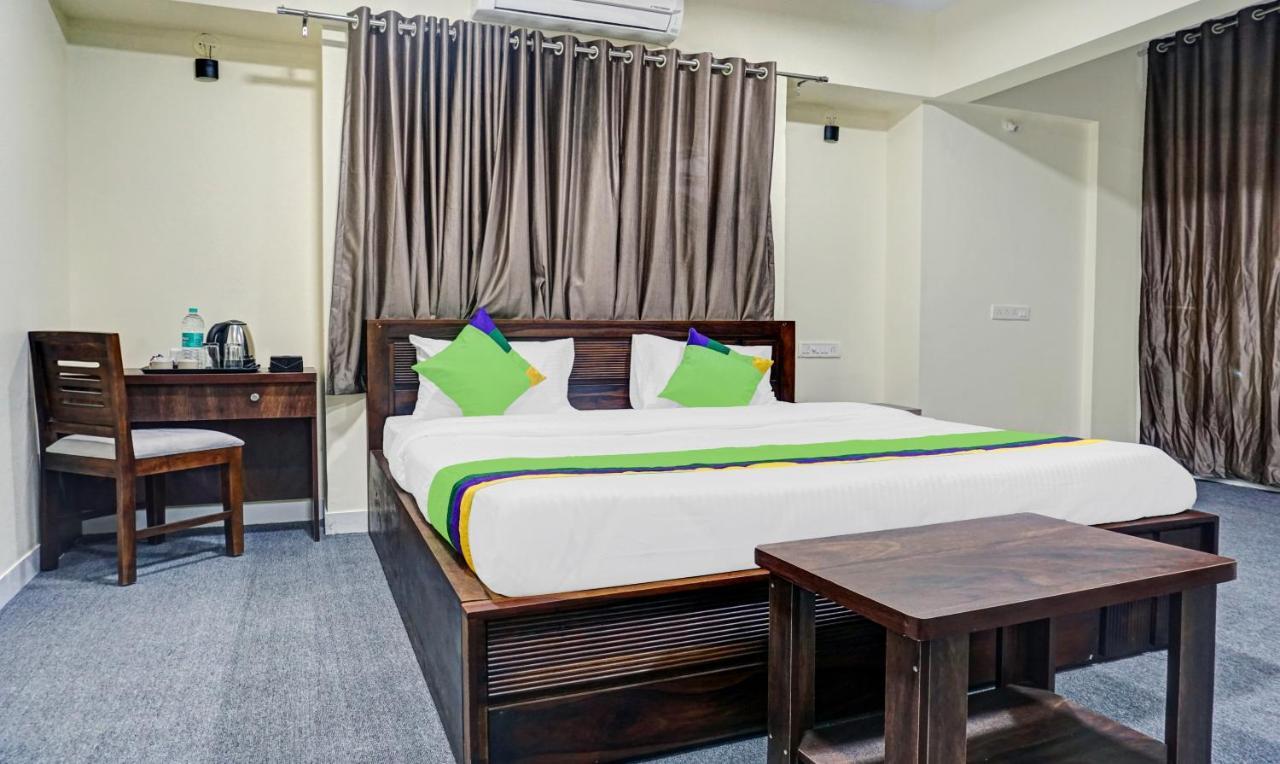 Treebo Tulip Hotel Пюн Екстериор снимка