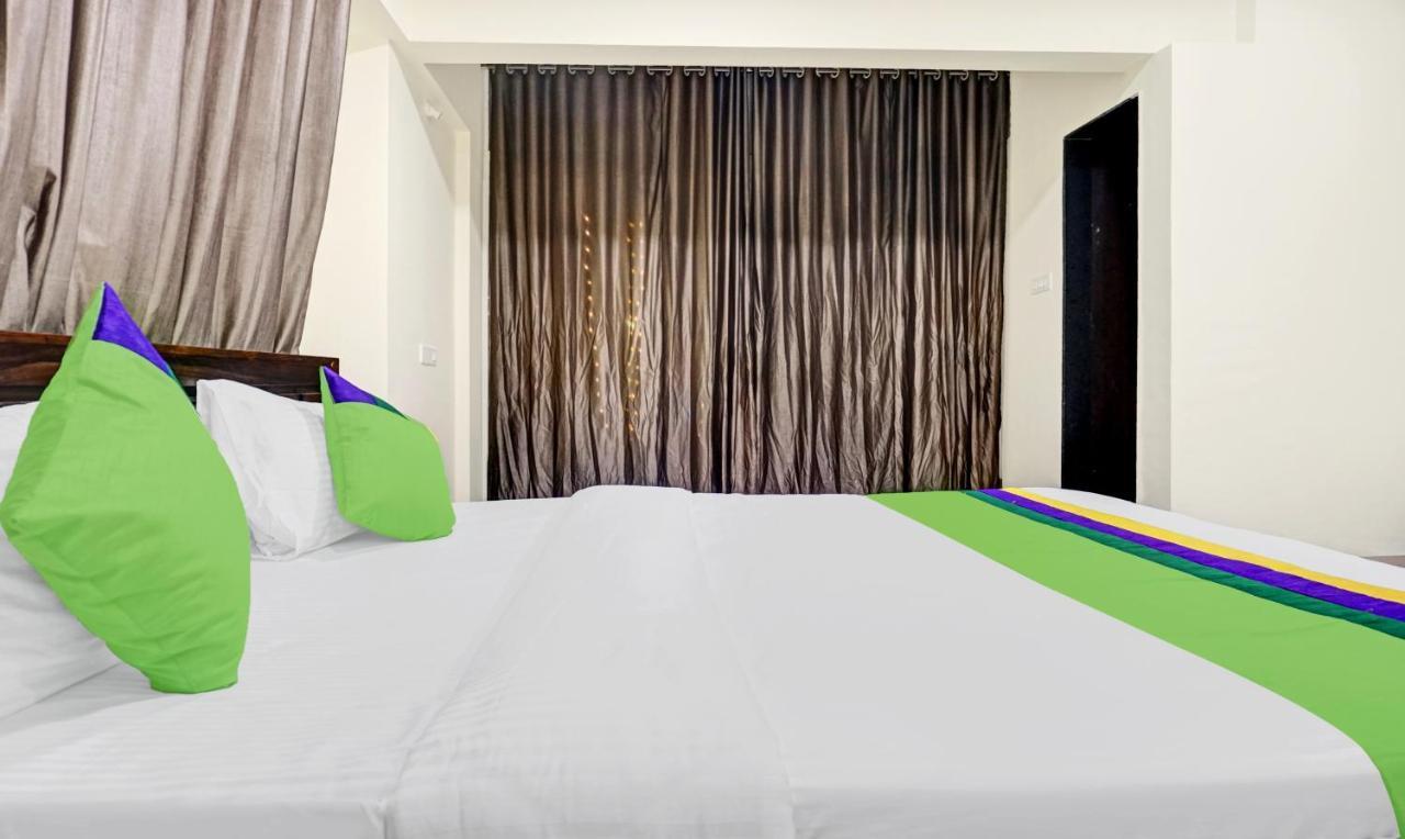 Treebo Tulip Hotel Пюн Екстериор снимка