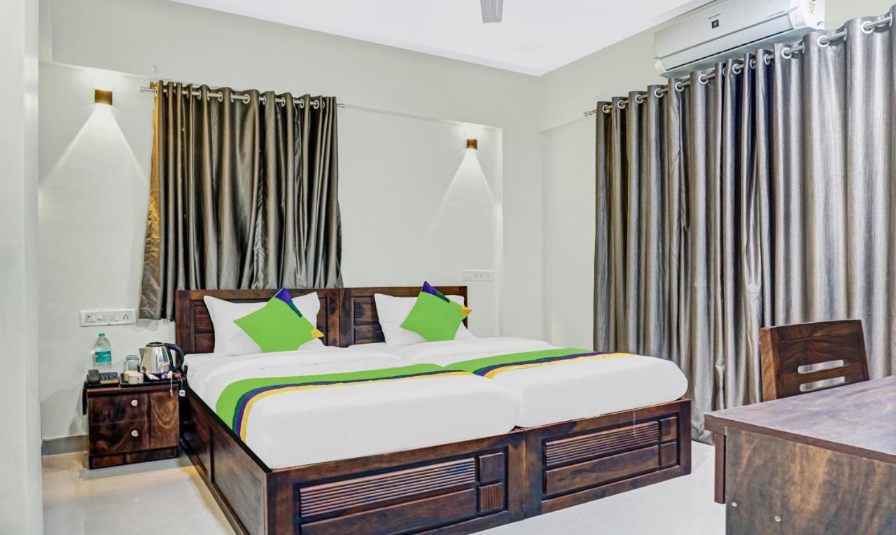 Treebo Tulip Hotel Пюн Екстериор снимка